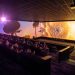 SCREENX bioskopska sala u CineStar bioskopu sa panoramskom projekcijom od 270 stepeni tokom filmske projekcije.
